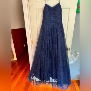 Size 20, dark blue and rhinestones that will light the room up